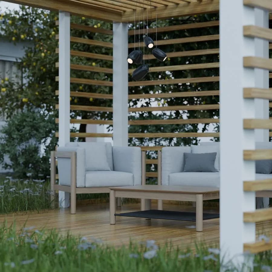 Outdoor seating beneath a wooden pergola