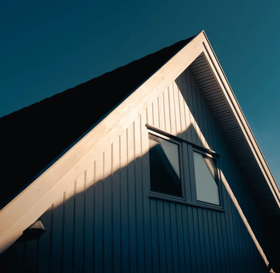 Modern home roof in late-day sunlight
